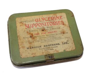 an old antique tin that originally contained glycerine suppositories - photo by bluebudgie