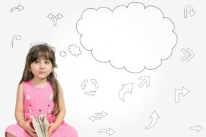 A cute little girl with long brown hair in a pink dress sits with a book in her hands looking vague as a daydreaming bubble and arrows in many directions float around her.